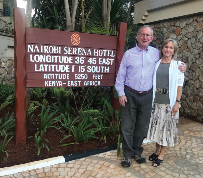 Photo of Tom and Jill Moller standing by Nairobi sigh