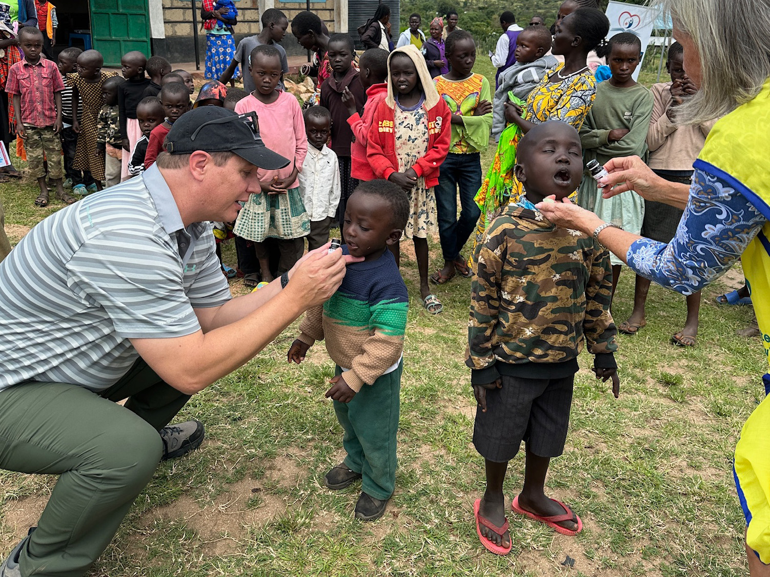 Photo of children getting worm medicine