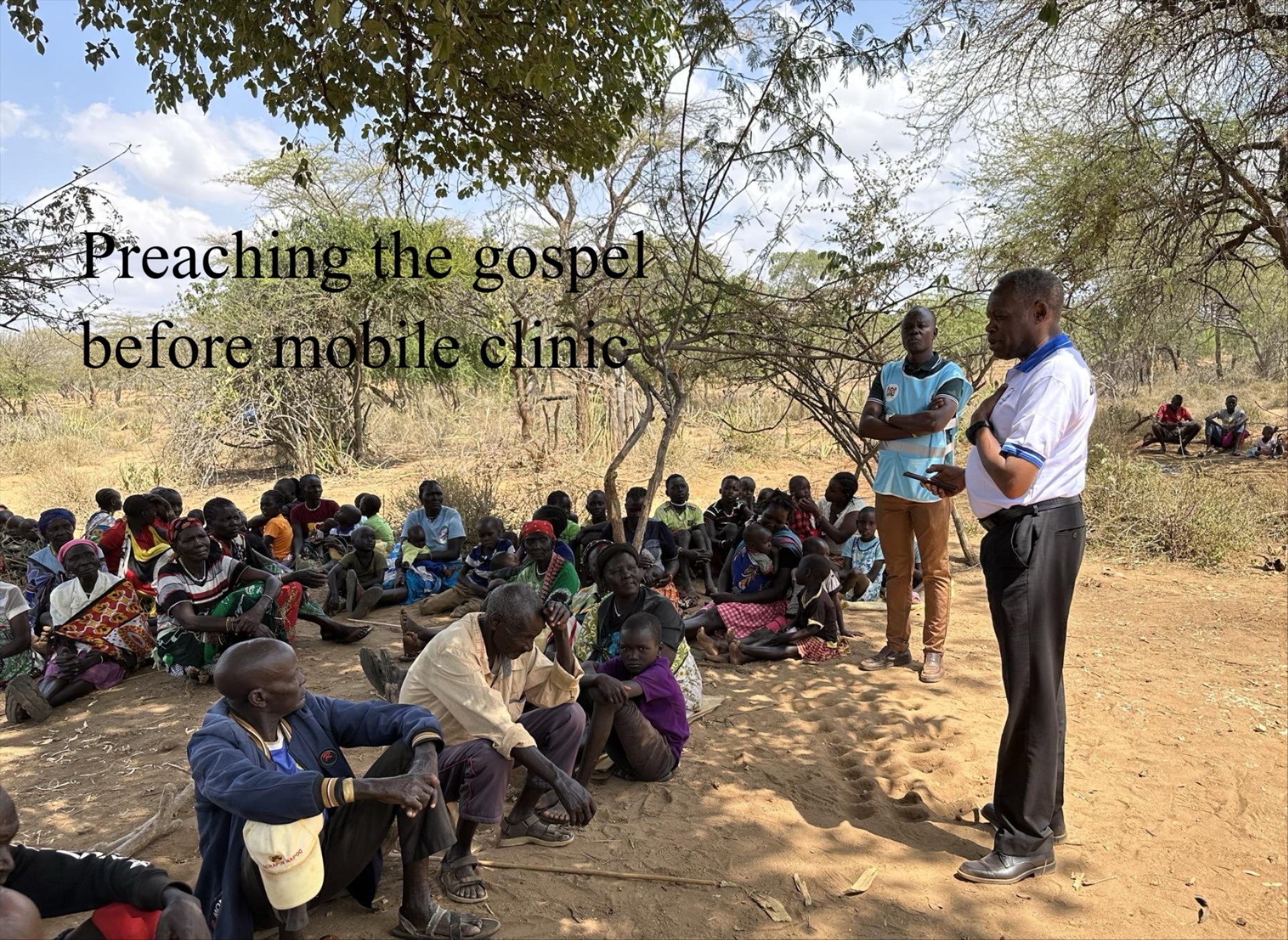 Preaching the gospel before mobile clinic